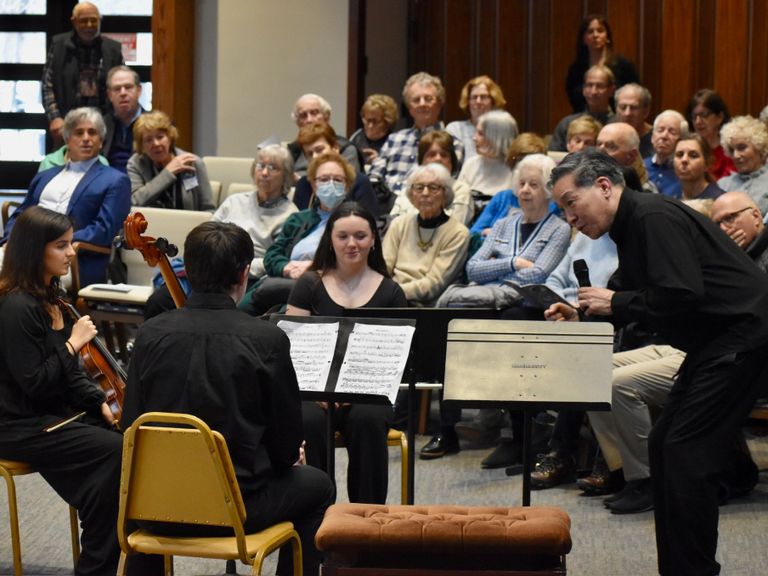 Youth ensemble receiving mini-Master Class from Ying Quartet